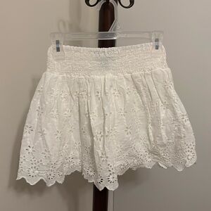 Eyelet lace flared white mini skirt